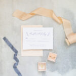 Deckled edge wedding invitation response card