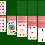 Demonstration of sequencing cards in Klondike Solitaire tableau by alternating colors and descending rank.